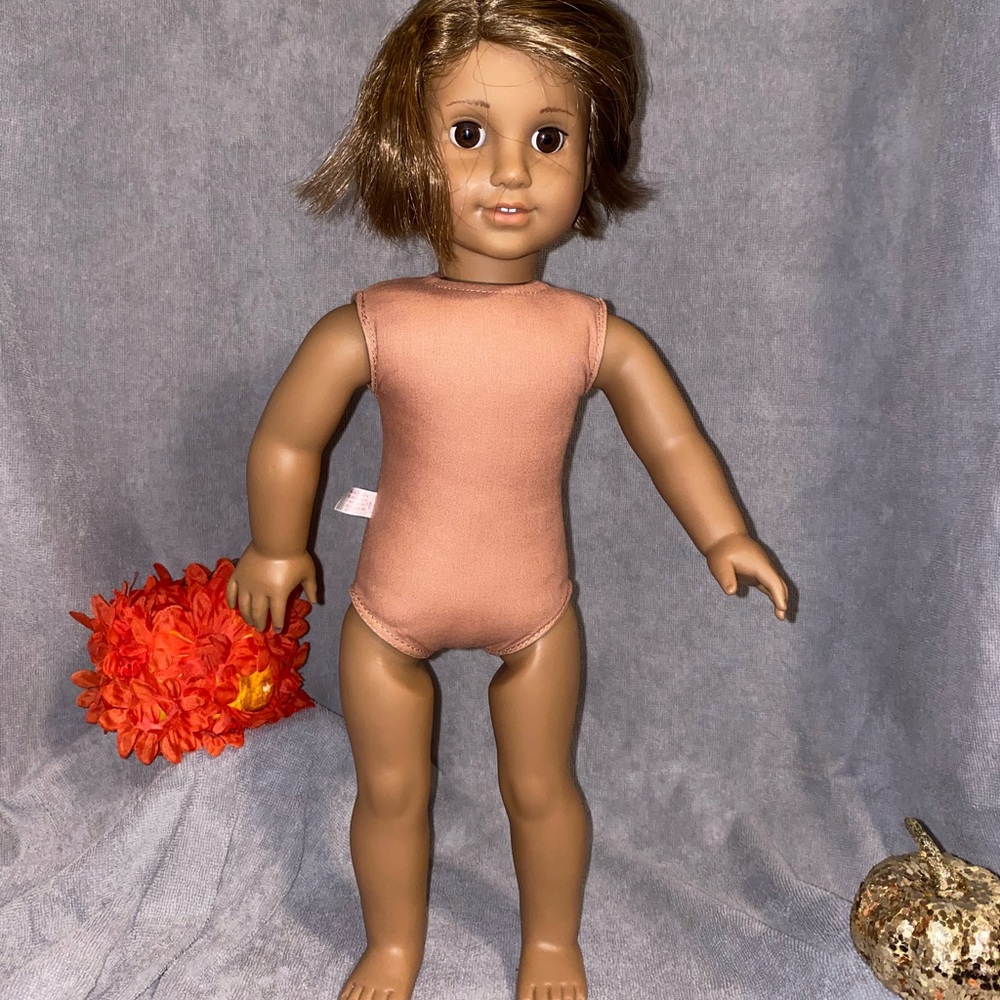 American Girl Marisol Luna with haircut and drawing on her face